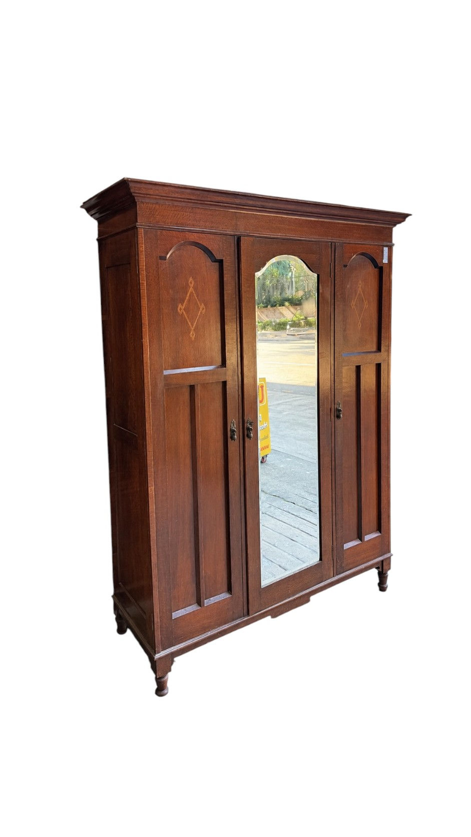 Thumbnail: Antique Oak Triple-Door Wardrobe with Beveled Mirror & Inlay Details