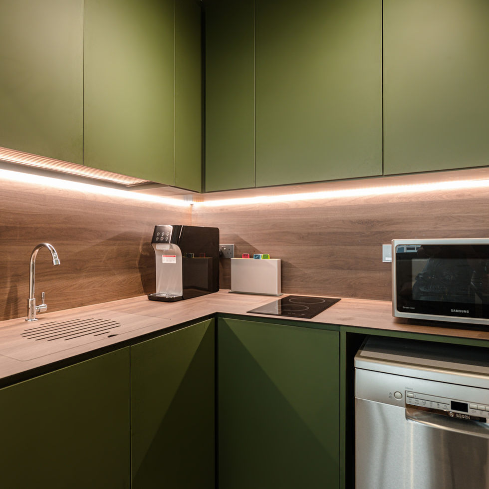 Moss Green L-shape Kitchen Cabinet with a KompacPlus Counter top as an open kitchen concept idea