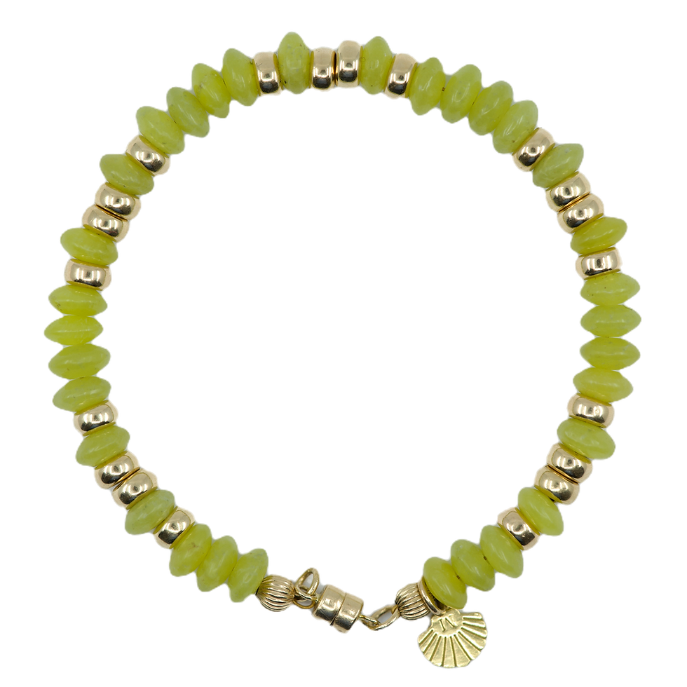 Bright green beaded bracelet with gold accents, close-up shot on black background.