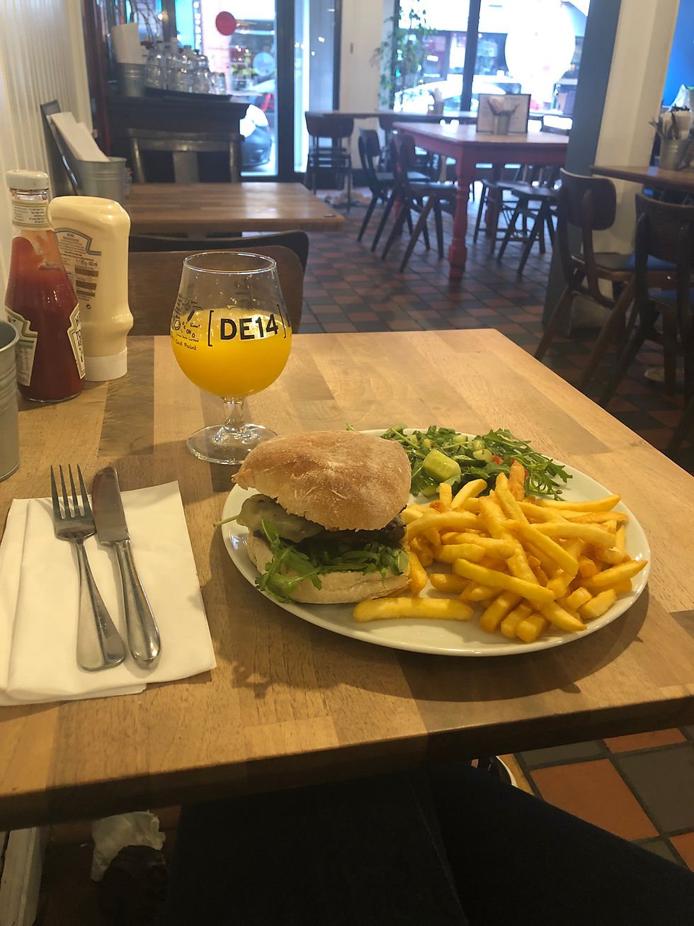 NYC burger with mustard mayo chips and salad from Teacup Kitchen in Manchester's Northern Quarter.