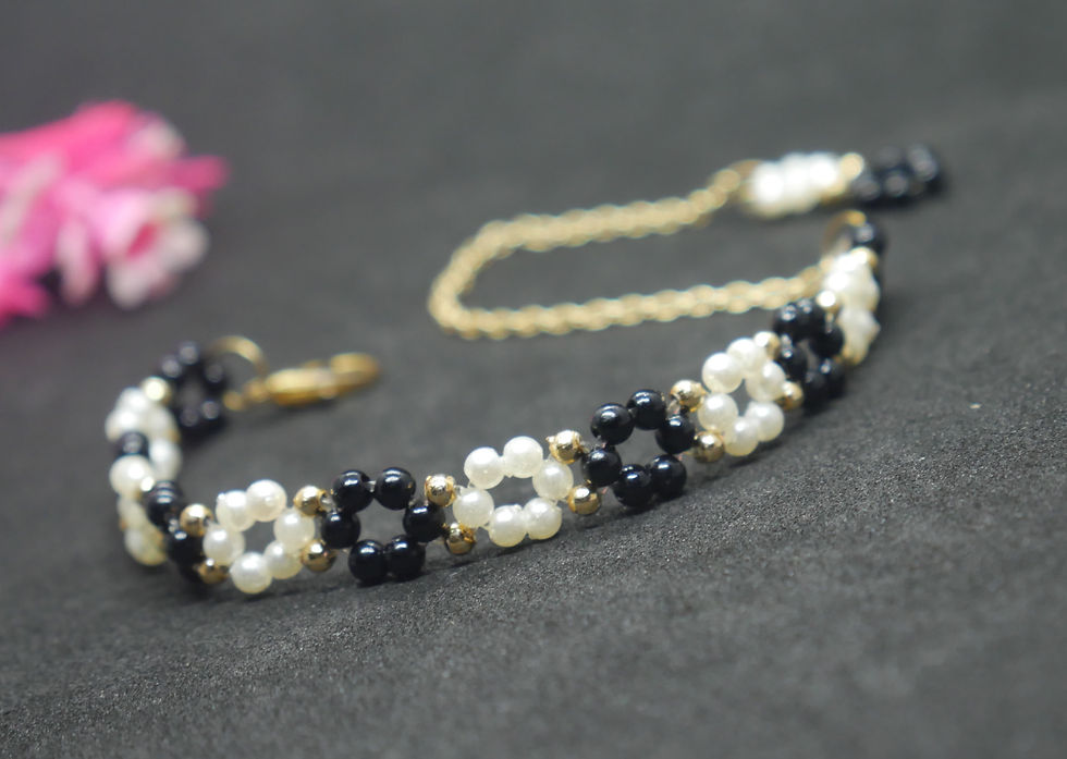 Thumbnail: Handmade black golden and white beaded Bracelet for women and Girls