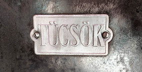 Tücsök, a kályha