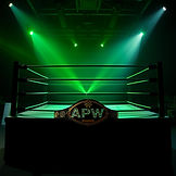 Wrestling Ring with APW Championship belt in green hues_.jpg