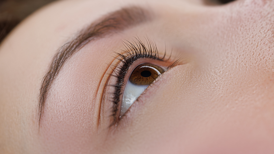 Closeup image of a women's SPMU eyeliner services available at Apricity Aesthetics® - Brixton & Clapham, South London, England UK