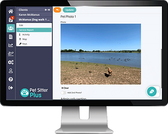 Laptop showing visit reports in the client portal for pet sitting software
