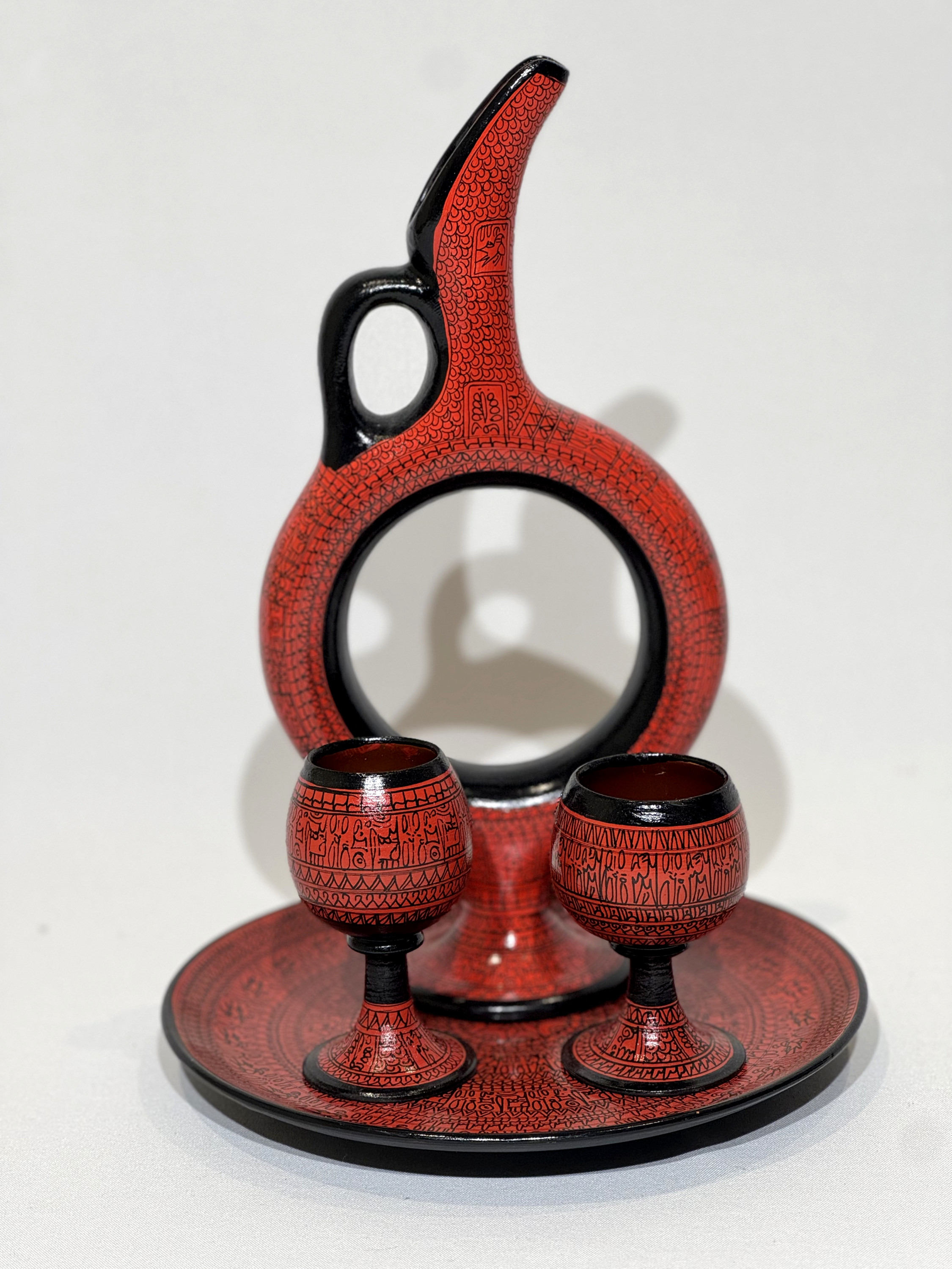 Red and black ceramic Turkish tea set with pitcher, two glasses, and tray. GTA rental (Oakville, Mississauga, Milton, North York, Burlington)