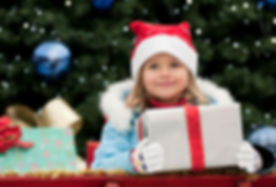 Little Girl with Christmas Present