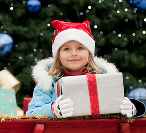 Little Girl with Christmas Present