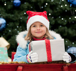 Little Girl with Christmas Present