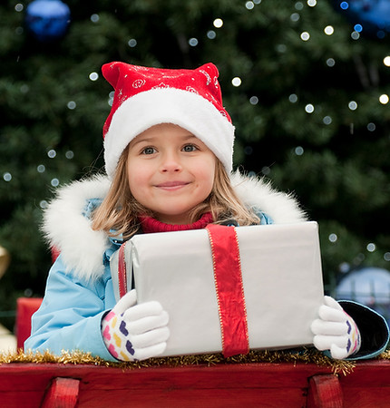 Little Girl with Christmas Present