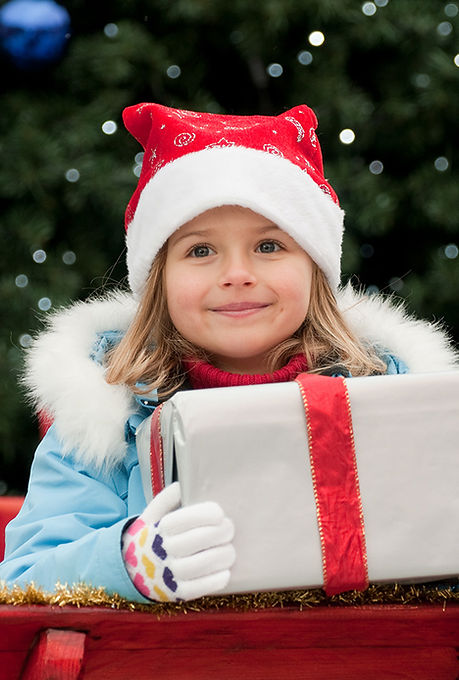 Little Girl with Christmas Present