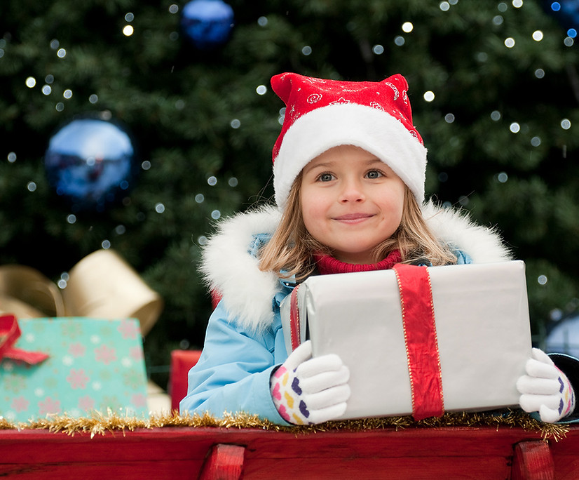 Little Girl with Christmas Present
