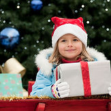 Little Girl with Christmas Present