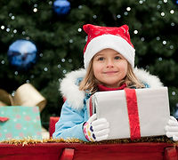 Little Girl with Christmas Present