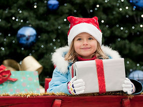 Little Girl with Christmas Present