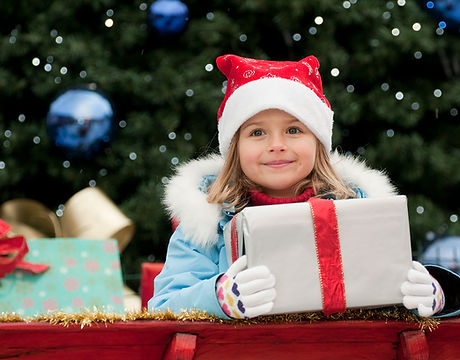 Little Girl with Christmas Present