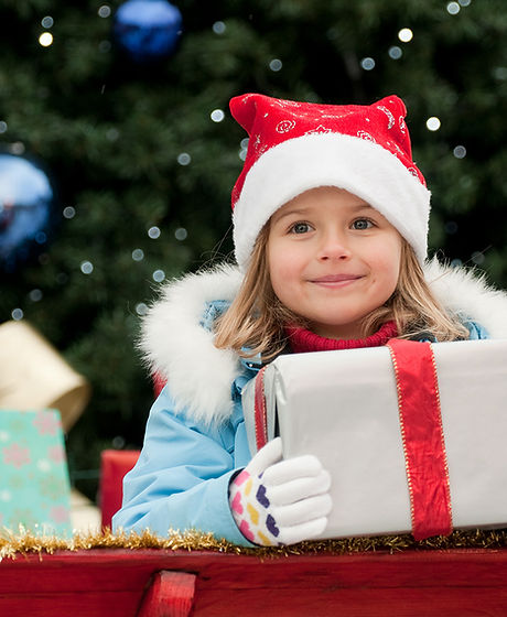 Little Girl with Christmas Present