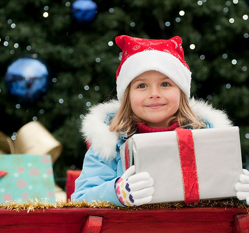 Little Girl with Christmas Present