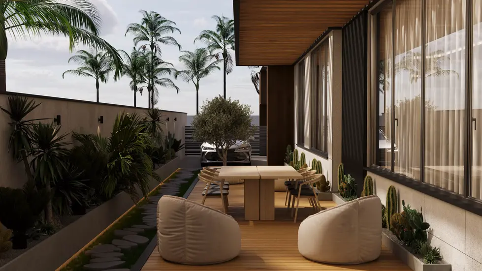 Cozy outdoor patio with wooden deck, soft lounge seating, a dining table, lush tropical plants, and palm trees along the boun