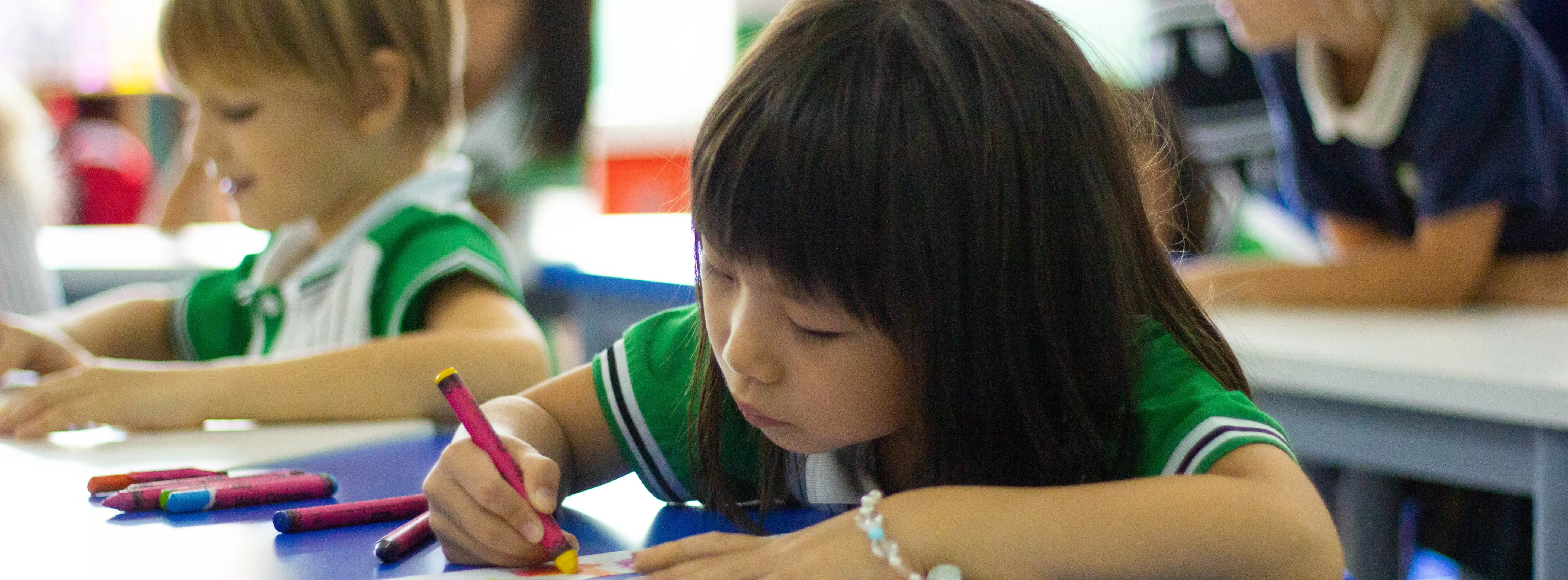 girl-talking-with-boy-during-lesson 2 copy.webp