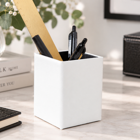 White Italian leather pen pot, handcrafted in England and designed to keep pens and desk essentials neatly organised.