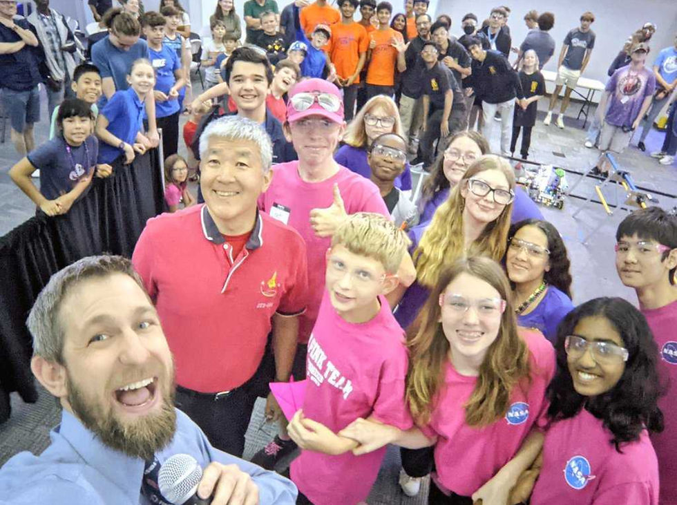 FTC Legacy Teams students and mentors posing at a competition.