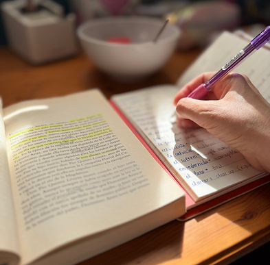 I am reading and writing words on my notebooks.