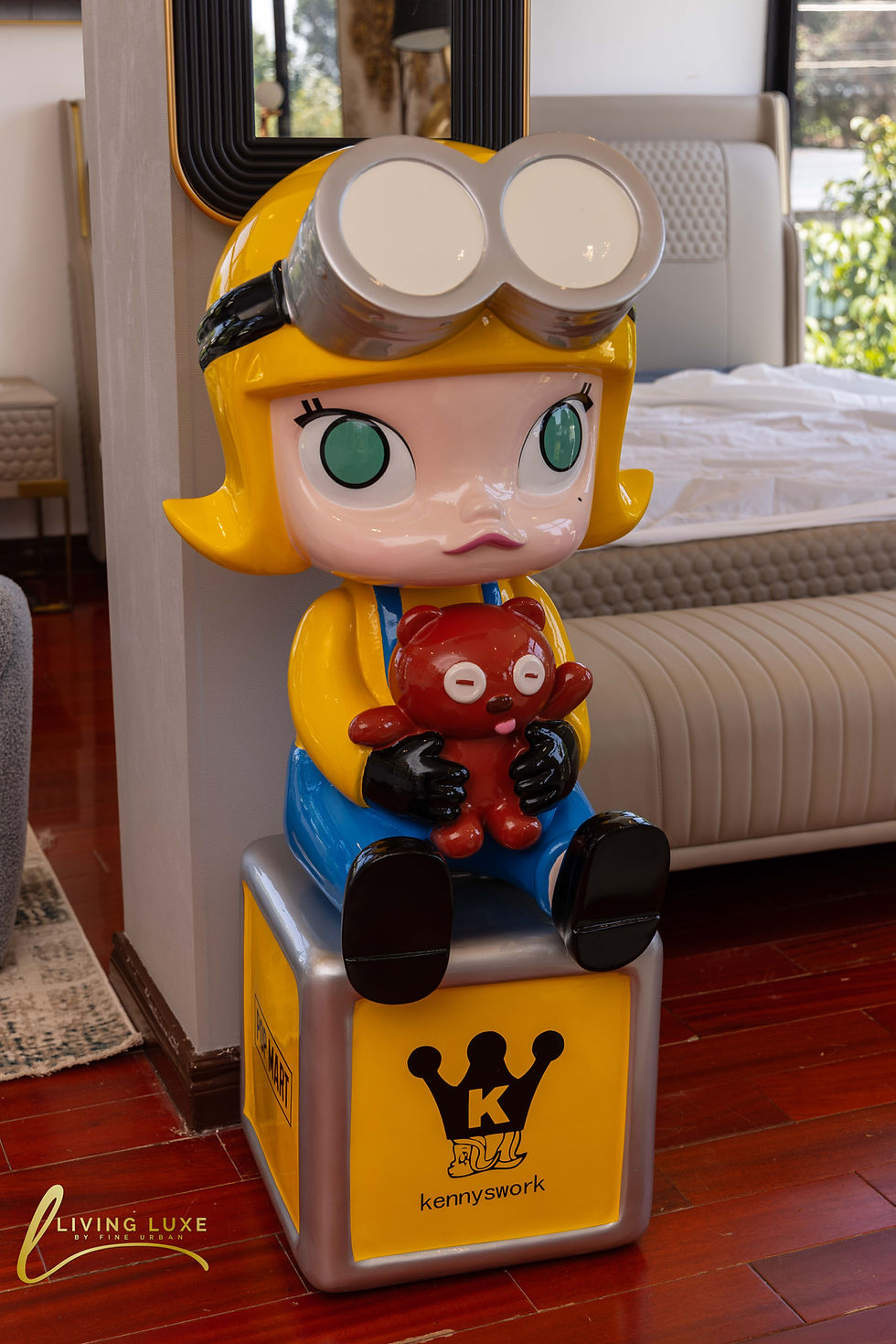 a Perfect Popmart Kennyswork Minions Molly figurine. It is a collectible toy that combines the design of Kennyswork's Molly character with the Minions franchise