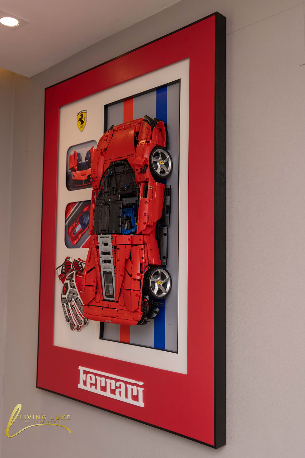 Framed Lego Ferrari SP3 model car, a striking display piece. Available at The Living Luxe, Karen.