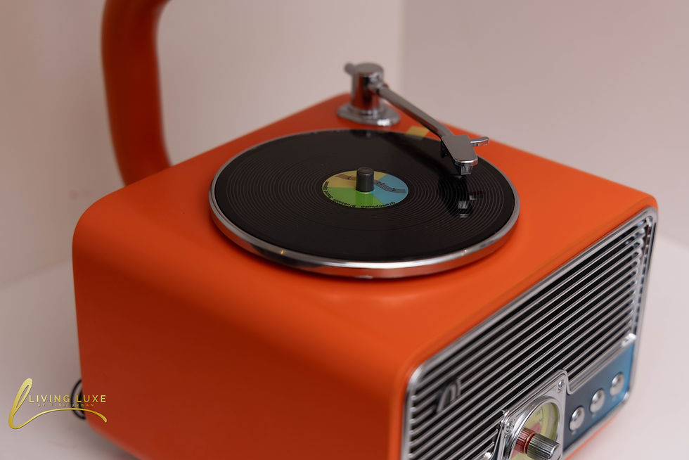 Vintage orange gramophone record player from The Living Luxe, Karen.