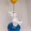Thumbnail: a Nordic Balloon Flying Bear Rabbit Resin Ornament. It features a white bear-rabbit hybrid figure sitting on a blue ball, holding a yellow balloon.