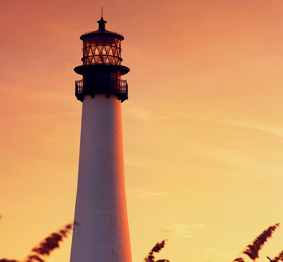 Lighthouse At Sunset