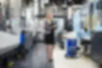 woman-using-tablet-at-machine-in-factory-shop-floo-2022-12-16-22-19-18-utc.webp