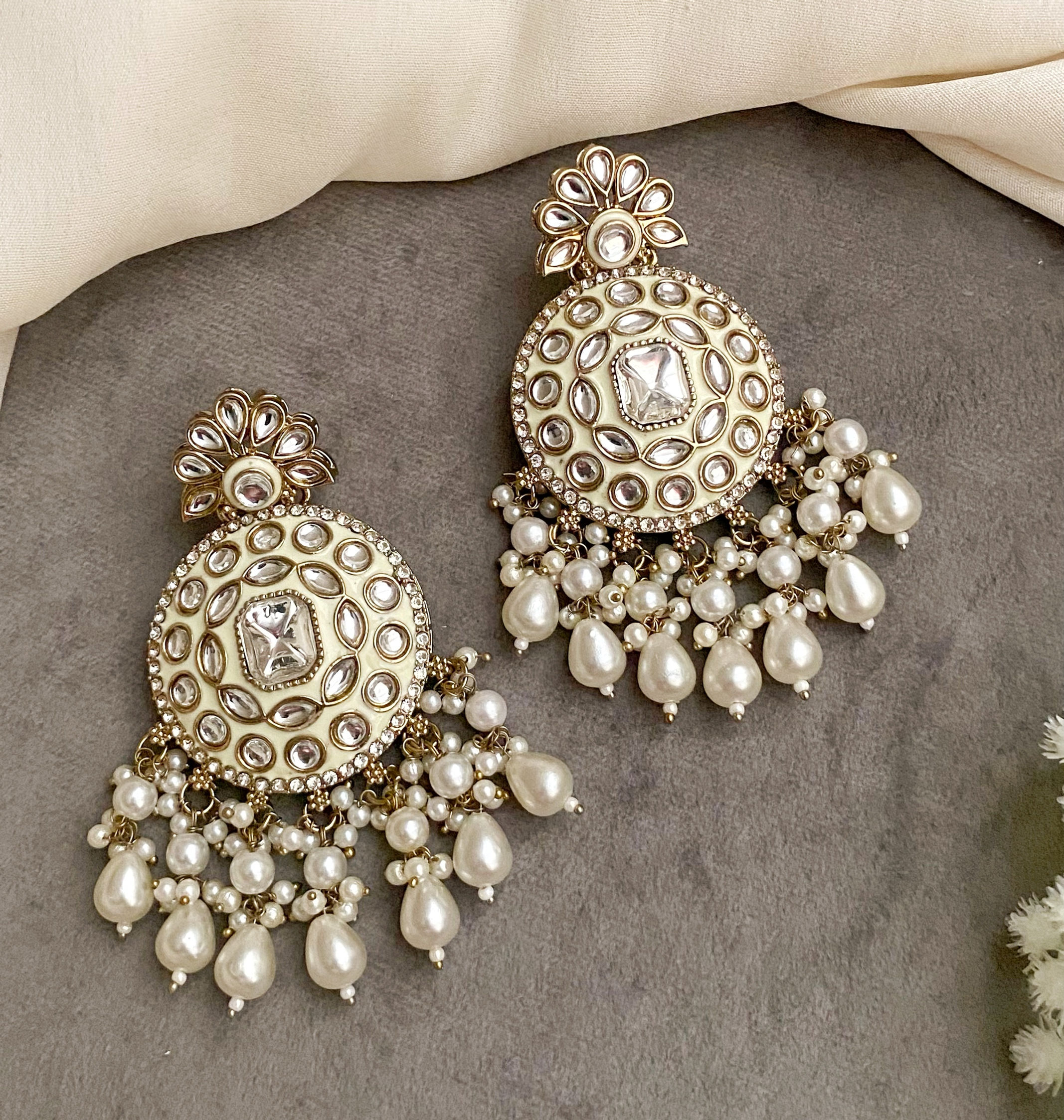 Tiya ivory kundan earrings