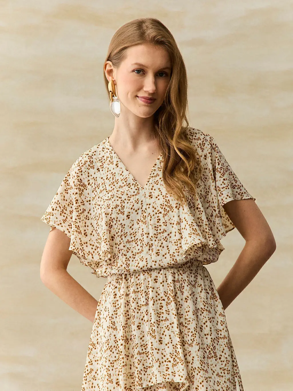 Blusa Decote V e Manga Jabour