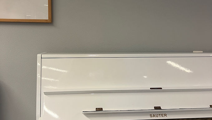 Sauter upright piano high gloss white