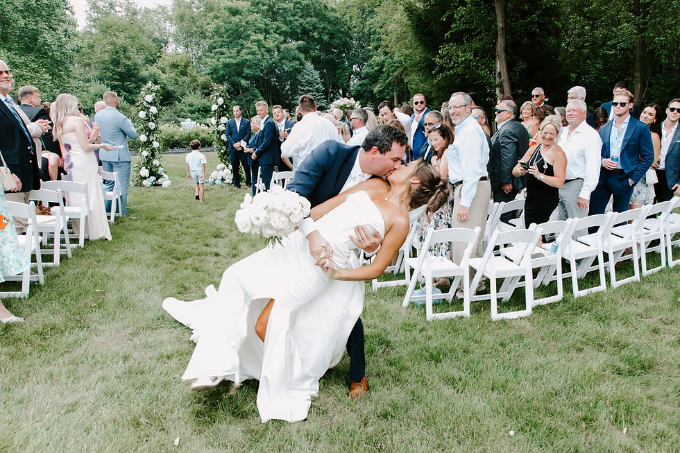 Outdoor wedding ceremony during a Michigan backyard wedding