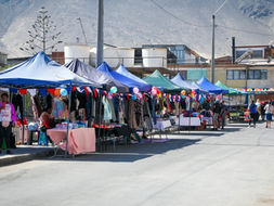 Recuperan calle Soldado Rubilar en Antofagasta con pavimentación total y nueva feria comunitaria