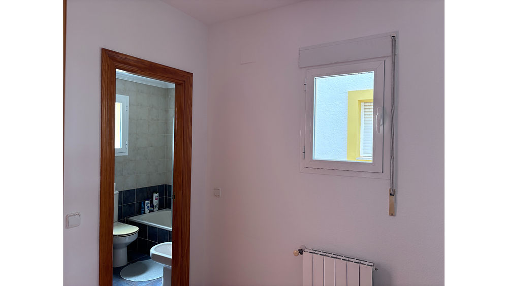 Bathroom and bedroom view in a holiday bungalow calpe