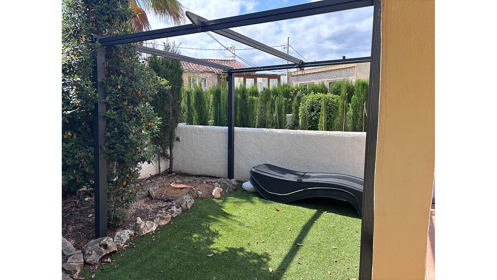 Outdoor terrace with seating at a holiday bungalow calpe