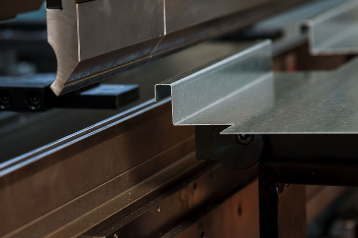 Close up of a CNC press brake bending sheet metal