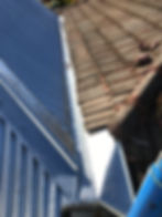 Box gutter keyed to tiled roof