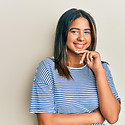young-latin-girl-wearing-casual-clothes-smiling-looking-confident-camera-with-crossed-arms