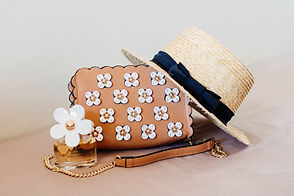 brown-sun-hat-on-brown-and-white-floral-