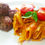 Miniatura: Penne integral ao molho italiano + almondega assada (200 gramas)