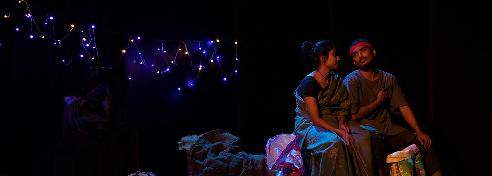 Two garbage collectors are talking about future in a festive Durga puja evening in Pokamakorer Kutum by Mohit Chattopadhyay