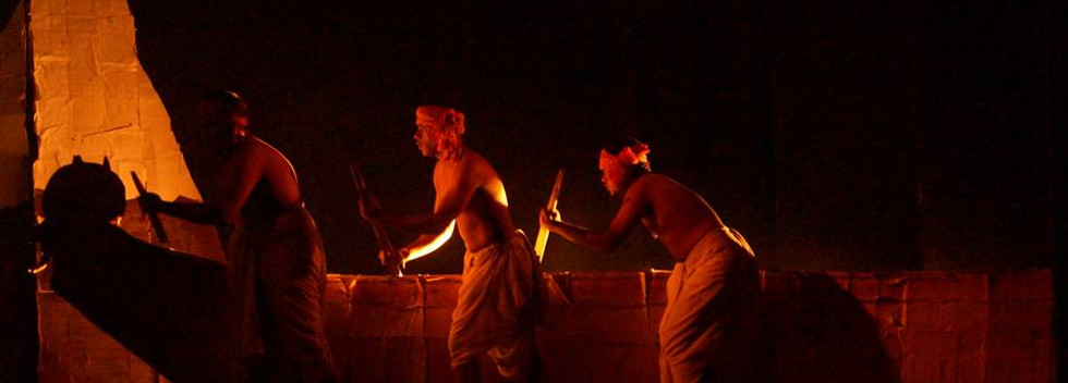 Boatmen rowing boats in search of Heaven in the play Hasanhatir Upokotha, a stage play by bodnaam theatre