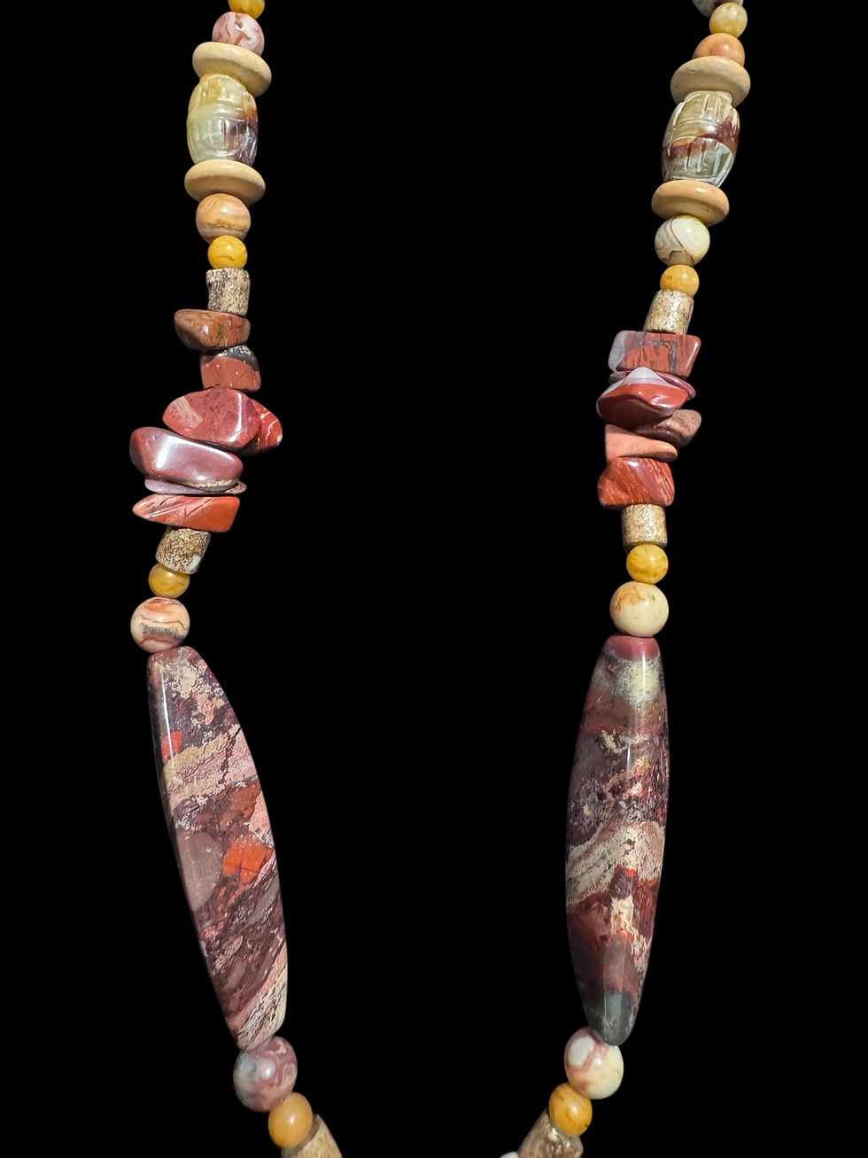 Thumbnail: fossilized coral necklace (for the son)
