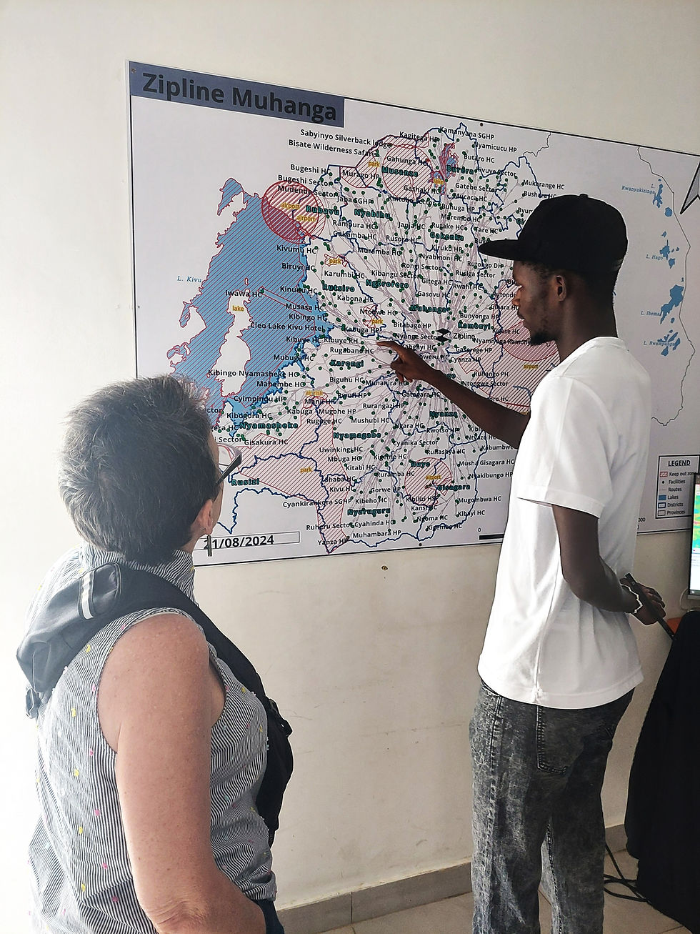 Our local guide explains the drone coverage (basically the entire country) on a map