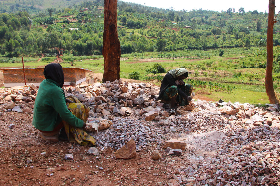 These, actually very nice women, but too shy for the camera, spend all day hammering rocks into small pieces.